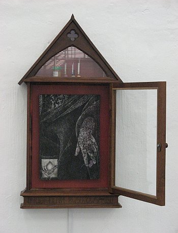 Click the image for a view of: Parturition - Amniotic. 2006. iluminated wooden reliquary, woodcut, silicone, found objects