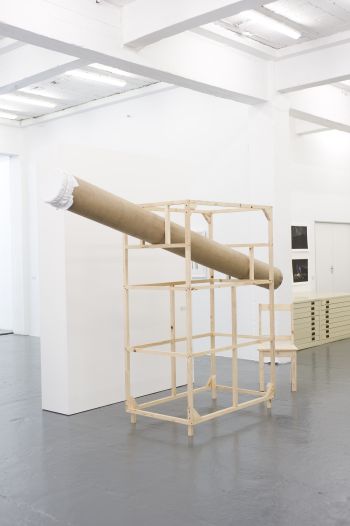 Click the image for a view of: Observation Structure 1. 2009. Cardboard tube, chair, wood, fabric pin drawing. Dimensions variable