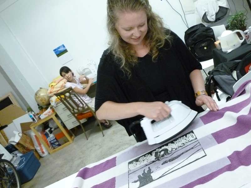 Click the image for a view of: Jessica ironing out the kinks… That's artist/grad student Yoko Hattori in the back